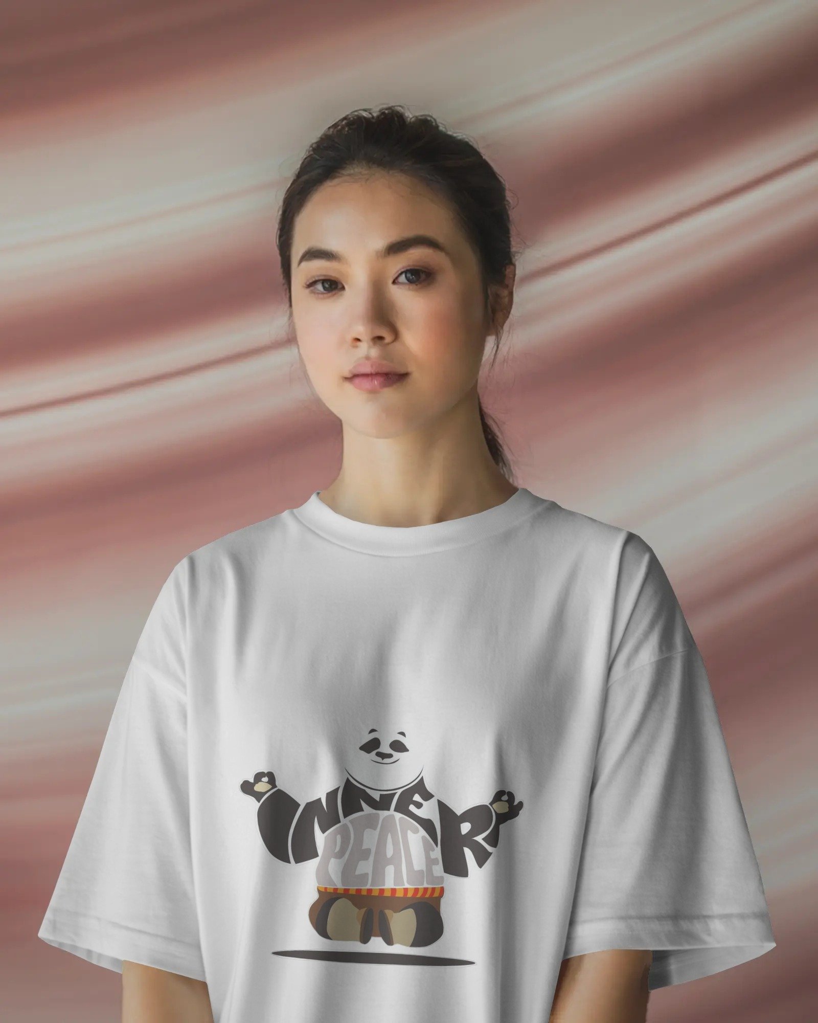 studio-tshirt-mockup-woman-in-white-tee-with-soft-focus-pink-swirled-backdrop-calm-expression-01814