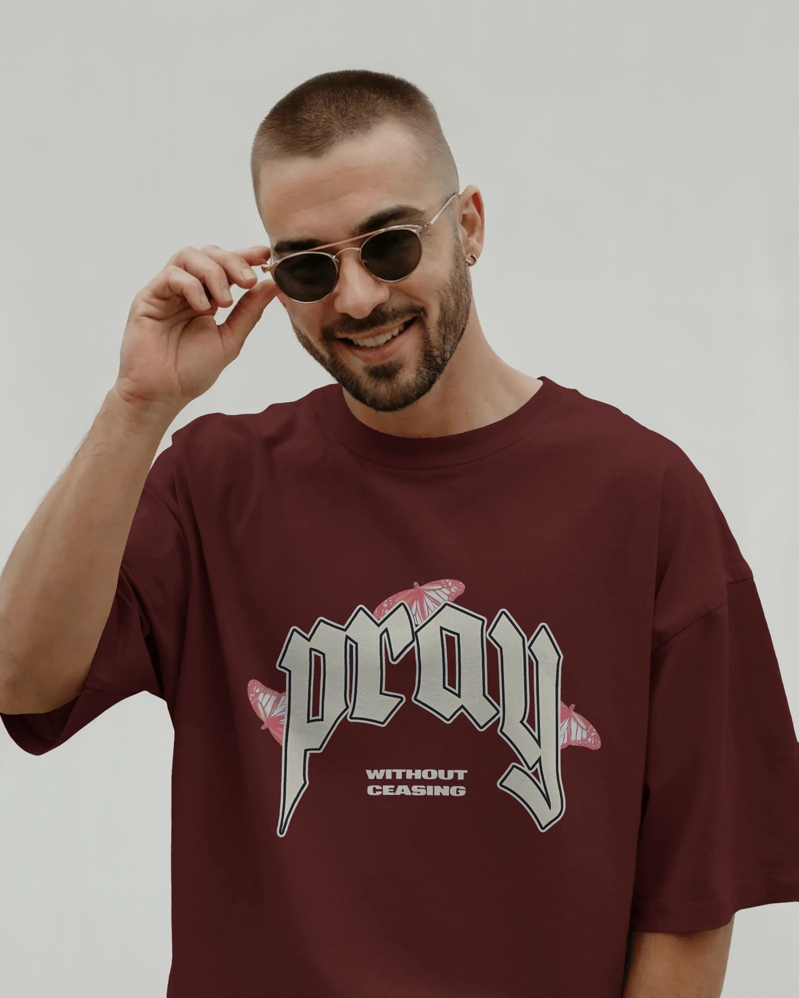 smiling-male-model-in-t-shirt-mockup-adjusting-sunglasses-on-clean-background-modern-stylish-look-02103 (3)